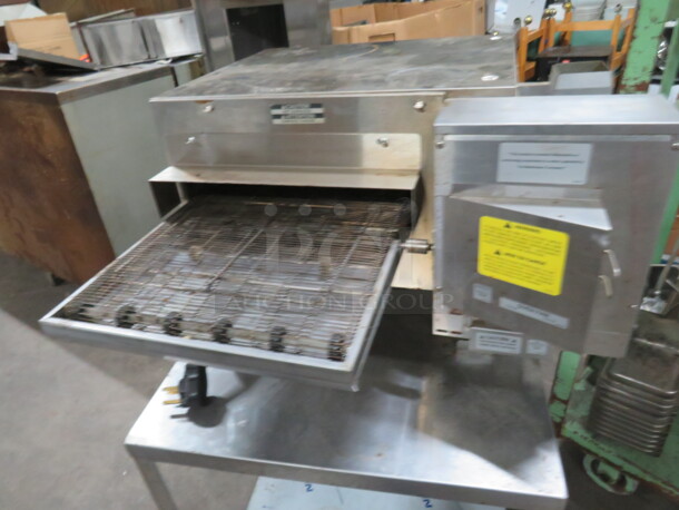 One CTI Lincoln Impinger Conveyor Pizza Oven On A Stainless Steel Table With SS Under Shelf On Casters. Model# 2502HB3U0701620. 240 Volt 1 Phase. Oven 50X32X18. Table 42X26X29. - Image 4 of 7