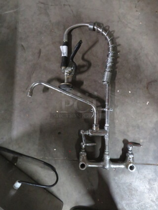 One Faucet With Hose Sprayer.