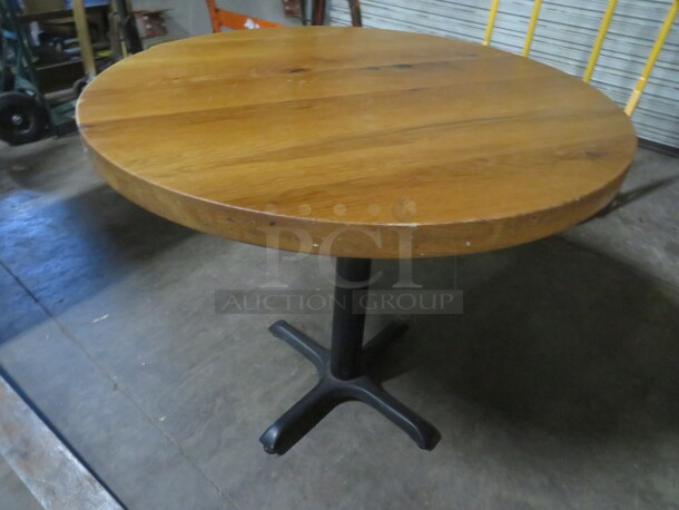 One 2 Inch Thick Solid Wooden Round  Table Top On A Pedestal Base. 36X36X30 - Image 3 of 3