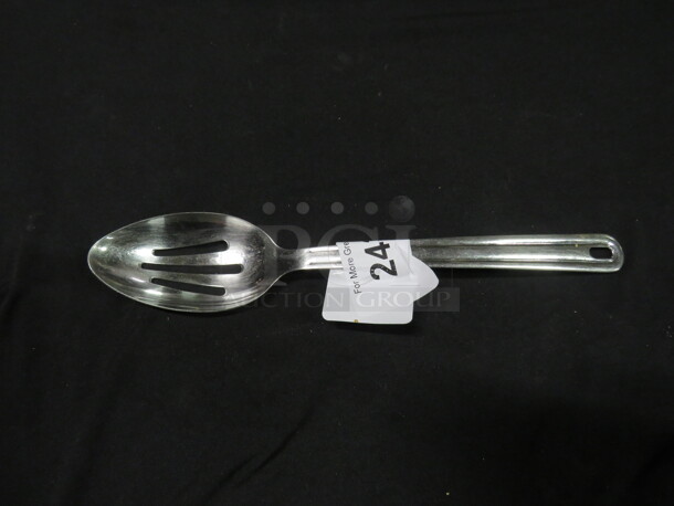 One Stainless Steel Slotted Spoon.