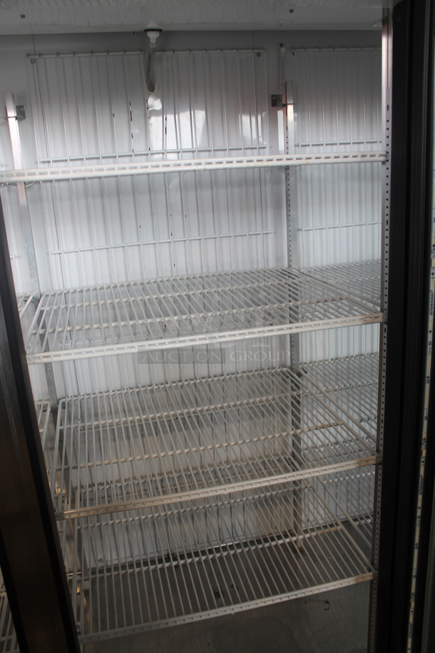 2016 True GDM-72F-HC-LD ENERGY STAR Metal Commercial 3 Door Reach In Freezer Merchandiser w/ Poly Coated Racks. 115/208-230 Volts, 1 Phase.  - Image 4 of 8