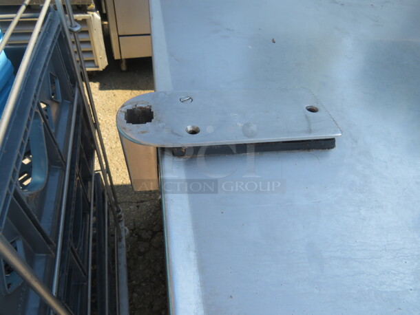 One Stainless Steel Table With 2 Stainless Steel Under Shelves, Back Splash, And A 10lb Can Opener, On Casters. 60X32X39 - Image 2 of 3