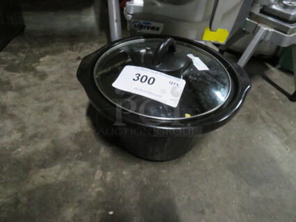 One Round Crock With Lid.