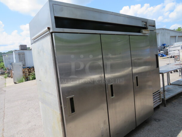 One Stainless Steel 3 Door Randell Refrigerator With 13 Racks On Casters. WORKING NOT COLD ENOUGH! 77X32.5X79.5