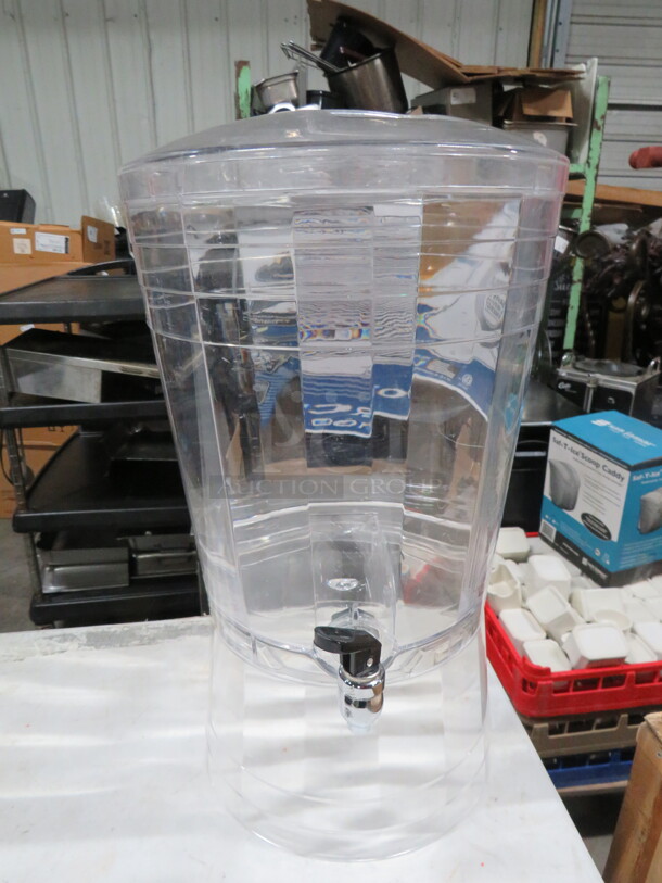 One Clear Poly Beverage Dispenser With Stand And A Cracked  LID. See Pics. - Image 1 of 2