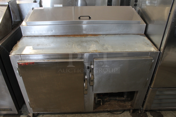 Stainless Steel Commercial Pizza Prep Table on Commercial Casters. 115 Volts, 1 Phase. Tested and Powers On But Does Not Get Cold - Image 1 of 4