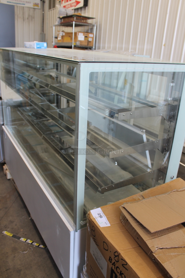 BRAND NEW SCRATCH AND DENT! 2023 Avantco 224BC72SW Metal Commercial 72" White Square Refrigerated Bakery Display Case with LED Lighting. 115 Volts, 1 Phase. See Pictures For Broken Glass. Tested and Working! - Image 1 of 4