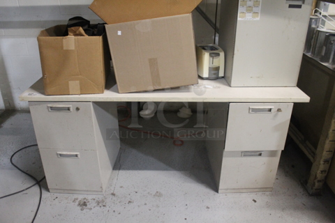 Gray 4 Drawer Desk w/ Contents. 