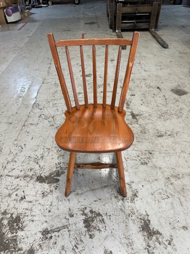 Sold Wooden Chair In An Oak Finish. 4XBID - Image 1 of 1