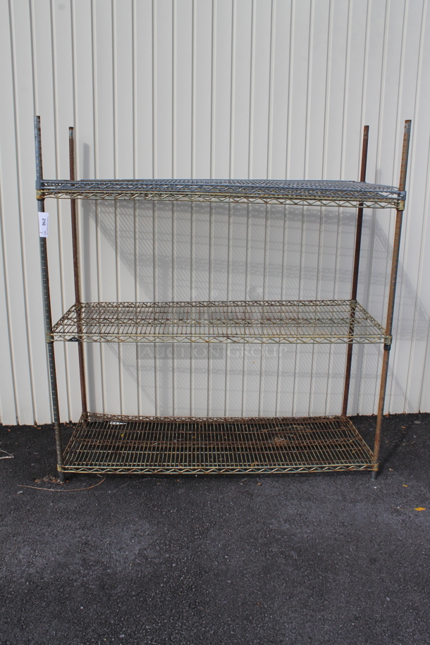 Chrome Finish 3 Tier Wire Shelving Unit. BUYER MUST REMOVE: BUYER MUST DISMANTLE. PCI CANNOT DISMANTLE FOR SHIPPING. PLEASE CONSIDER FREIGHT CHARGES. (outside) - Image 1 of 2