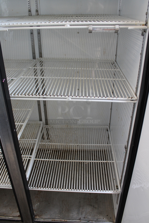 2014 True TG2R-2S ENERGY STAR Stainless Steel Commercial 2 Door Reach In Cooler w/ Poly Coated Racks on Commercial Casters. 115 Volts, 1 Phase. Tested and Working! - Image 3 of 4