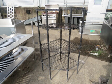 One Black Metro Corner Shelf With 4 Shelves. 33X26X55.5. 