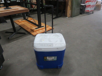 One Igloo 60 Quart Wheeled Cooler. 