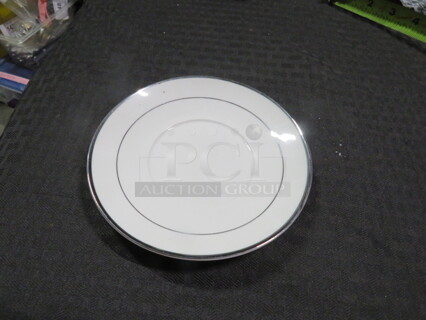 6 Inch Silver Rim Saucer. 7XBID