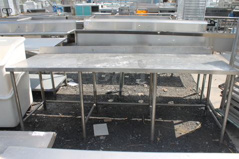 Stainless Steel Commercial Table w/ Back Splash.