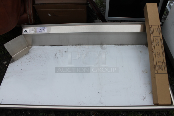 BRAND NEW SCRATCH AND DENT! Advance Tabco Stainless Teel Commercial Right Side Clean Side Dishwasher Table and Legs. - Image 1 of 5