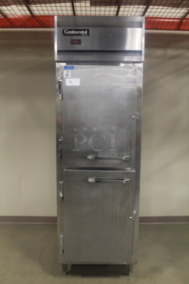 FANTASTIC! Continental Model DL1f-SS-HD Commercial Stainless Steel Half Door Reach In Freezer. 26x34x84. 115V/60Hz. Tested And Working!