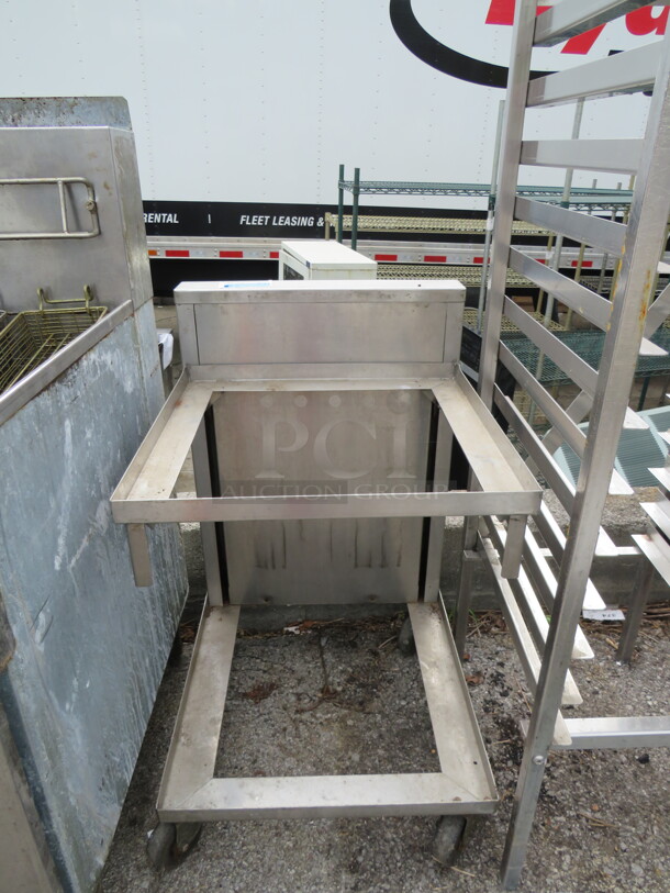 One Stainless Steel Spring Loaded Dishwasher Rack Cart On Casters. 20.5X25X34 - Image 1 of 1