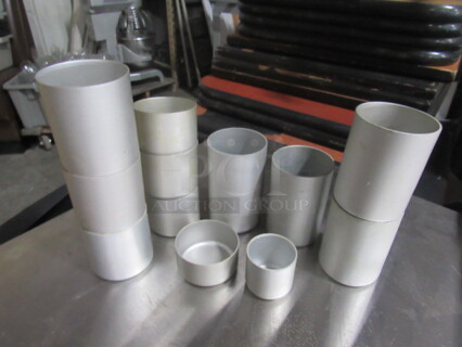 One Lot Of Assorted Size Aluminum Cylinders.