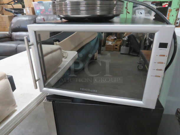 One WORKING Countertop Electrolux Wine Cooler. Model# FWC084HM. 110 Volt. 16X20X11. - Image 1 of 2