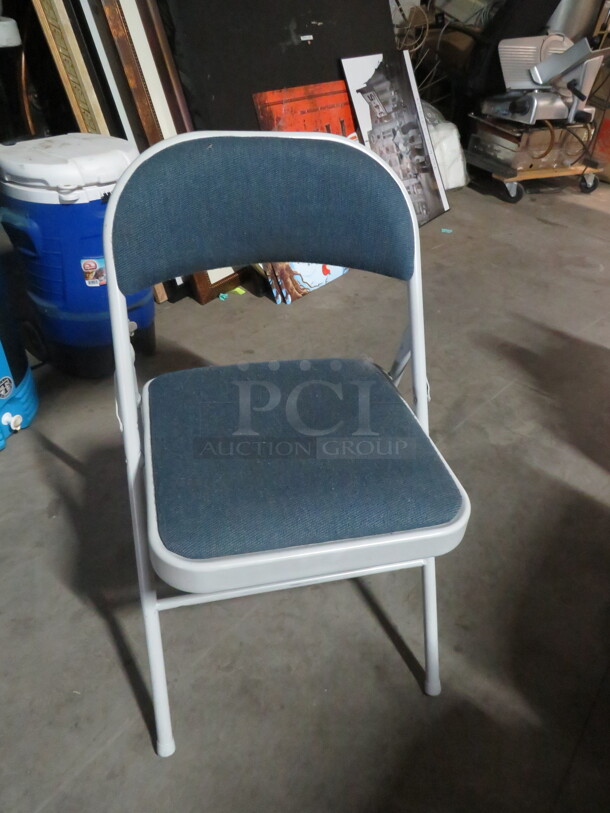 Folding Chair With Cushioned Seat And Back. 2XBID - Item #1108122
