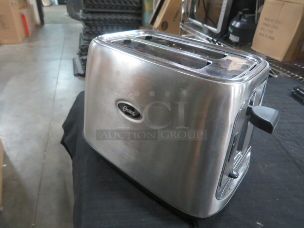 One Stainless Steel Oster 2 Slice Toaster. 120 Volt. #TSSTTRJB29.  - Image 2 of 2