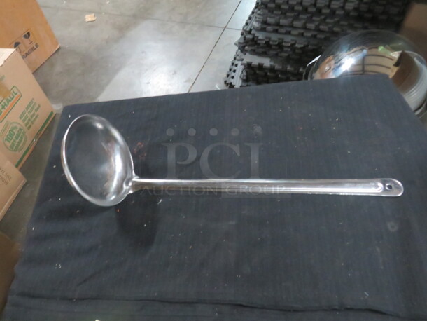 One Stainless Steel Ladle.