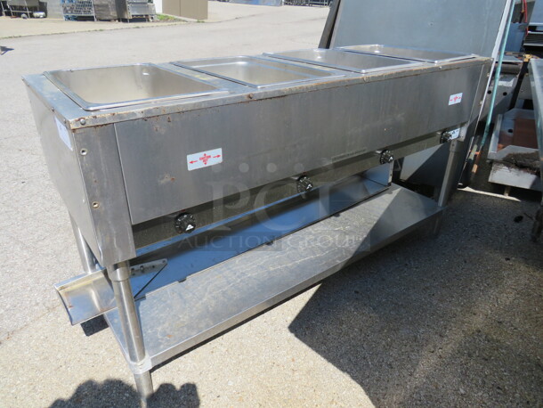 One Advance Tabco 4 Well Steam Table With SS Under Shelf. Model# HF-4E-120. 120 Volt. 2000 Watts. 62.5X23X34. $2014.20. - Image 1 of 2