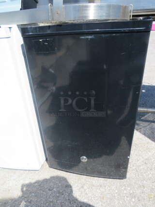 One WORKING  GE 1 Door Refrigerator With 3 Shelves. Model# GMR04GAEBBB. 115 Volt.  19.5X21X34.