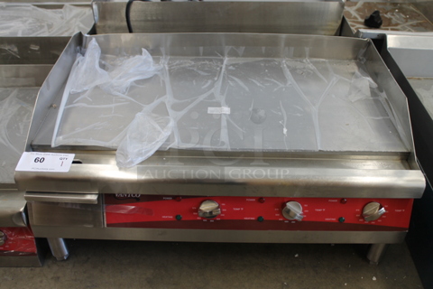 BRAND NEW SCRATCH AND DENT! Avantco 177EG30N Stainless Steel Commercial Countertop Electric Powered Flat Top Griddle w/ Thermostatic Controls. 208/240 Volts, 1 Phase.