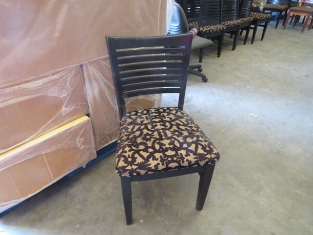 Wooden Chair Painted Black With A Cushioned Seat. 4XBID