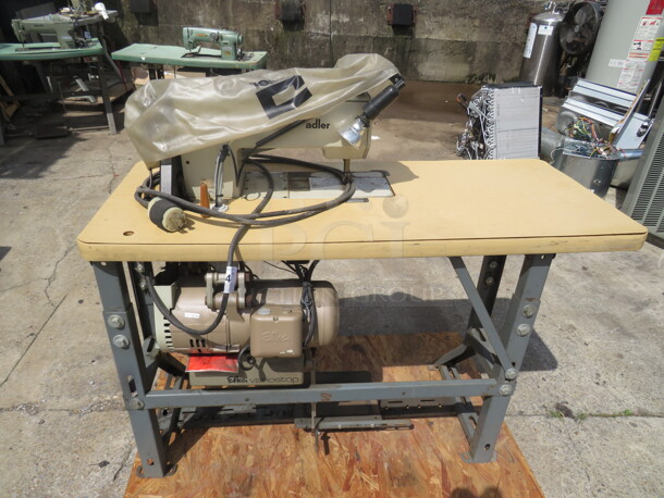 One Adler Sewing Machine On A Table. #467-FA-373. - Item #1112432