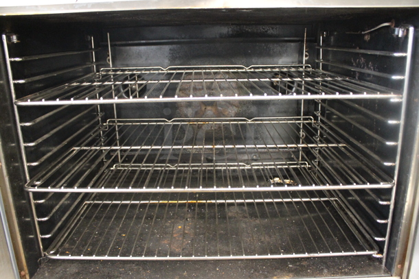 Blodgett Stainless Steel Commercial Natural Gas Powered Full Size Convection Oven w/ View Through Doors, Metal Oven Racks, Thermostatic Controls and Metal Legs on Commercial Casters. - Image 3 of 5