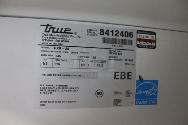 2014 True TG2R-2S ENERGY STAR Stainless Steel Commercial 2 Door Reach In Cooler w/ Poly Coated Racks on Commercial Casters. 115 Volts, 1 Phase. Tested and Working! - Image 7 of 7