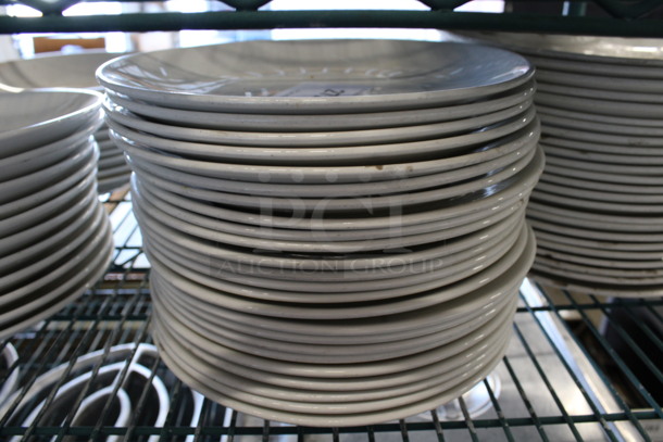 24 White Ceramic Plates. 10x10x1. 24 Times Your Bid!