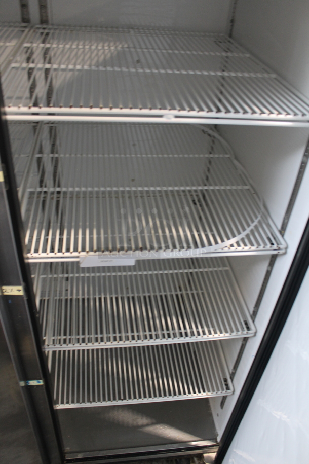 2015 True TG2R-2S ENERGY STAR Stainless Steel Commercial Two Door Reach In Cooler w/ Poly Coated Racks on Commercial Casters. 115 Volts, 1 Phase. Tested and Working! - Image 6 of 7