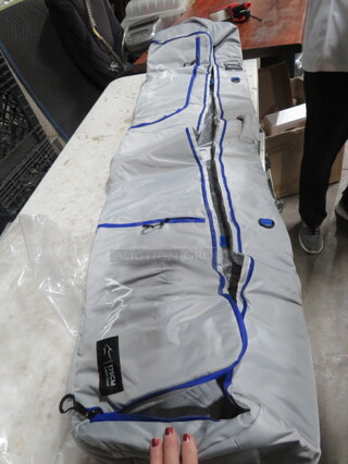 One NEW Caracalear Snowboard/Ski Padded Travel Bag.