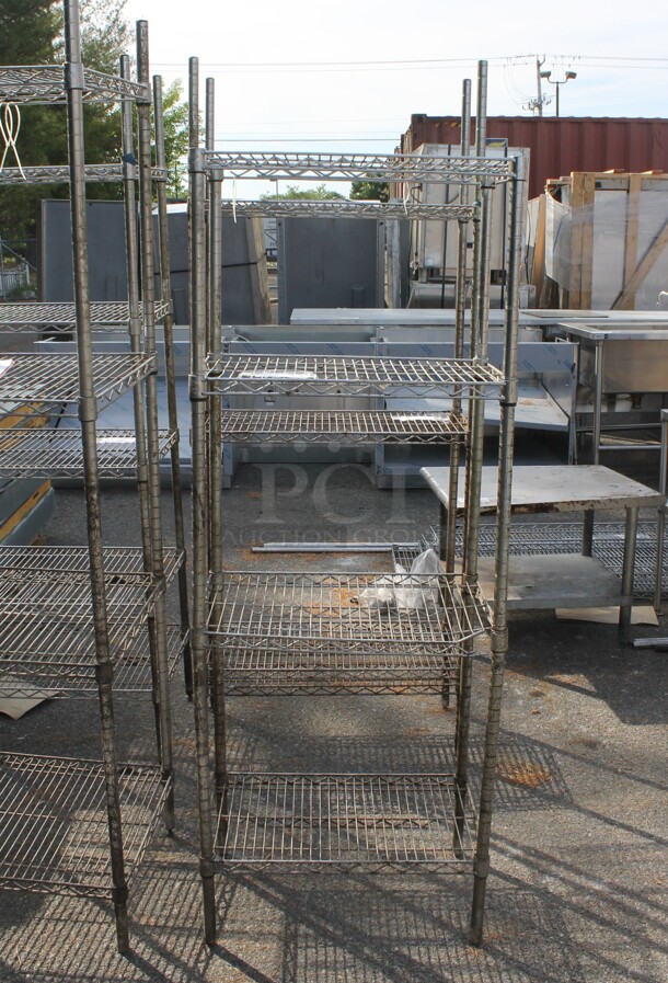 Chrome Finish 4 Tier Wire Shelving Unit. BUYER MUST DISMANTLE. PCI CANNOT DISMANTLE FOR SHIPPING. PLEASE CONSIDER FREIGHT CHARGES. - Image 1 of 4