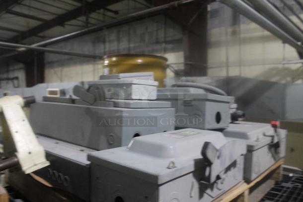 ALL ONE MONEY! Lot of Various Pallets; Black Poly and 1 Wooden w/ Gray Square D Metal Control Boxes. BUYER MUST REMOVE. - Image 3 of 4