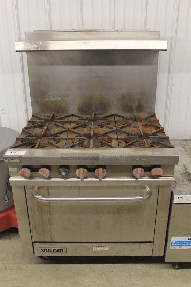 Vulcan Commercial Stainless Steel 6 Natural Gas Powered Burner Range With Standard Oven, Overshelf And Steel Racks.  - Image 1 of 6