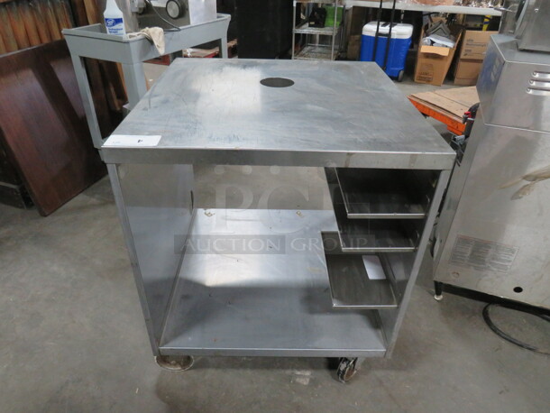 One Stainless Steel Cabinet With SS Under Shelf On Casters. 29X28X33