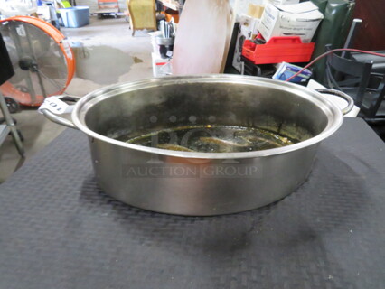 One Stainless Steel Roaster Pan.
