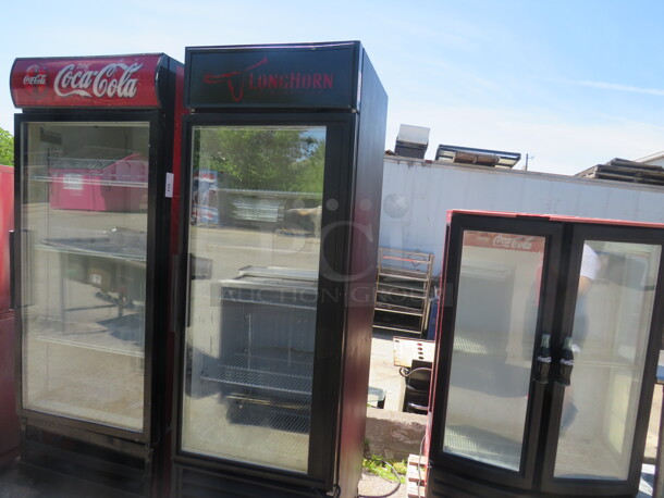 One True 1 Door Glass Display Freezer With 5 Racks On Casters. 115 Volt. Model# GBM-23F. 27X32X83.  - Image 1 of 2