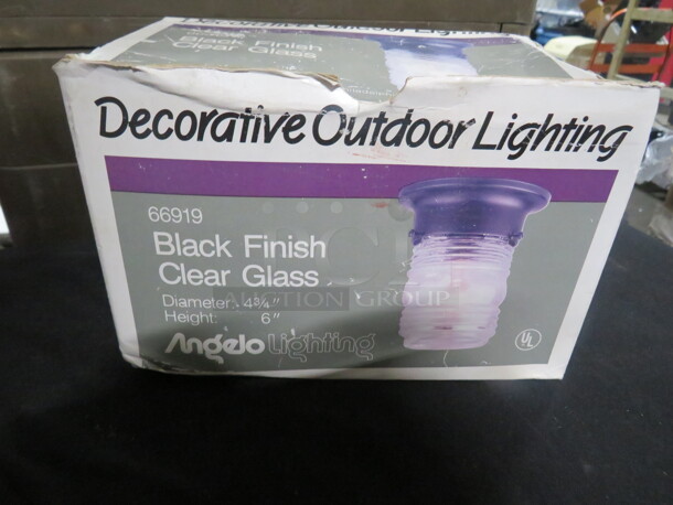 One NEW Outdoor Light Fixture In Black. - Image 1 of 1