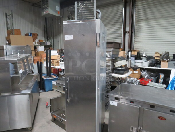 One Stainless Steel 1 Door Continental Refrigerator With 1 Rack On Casters. WORKING Model# 1RSE. 115 Volt. 18X36X80