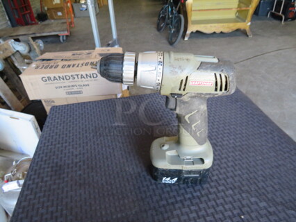 One Craftsman 14.4 Volt Cordless Drill With Battery.