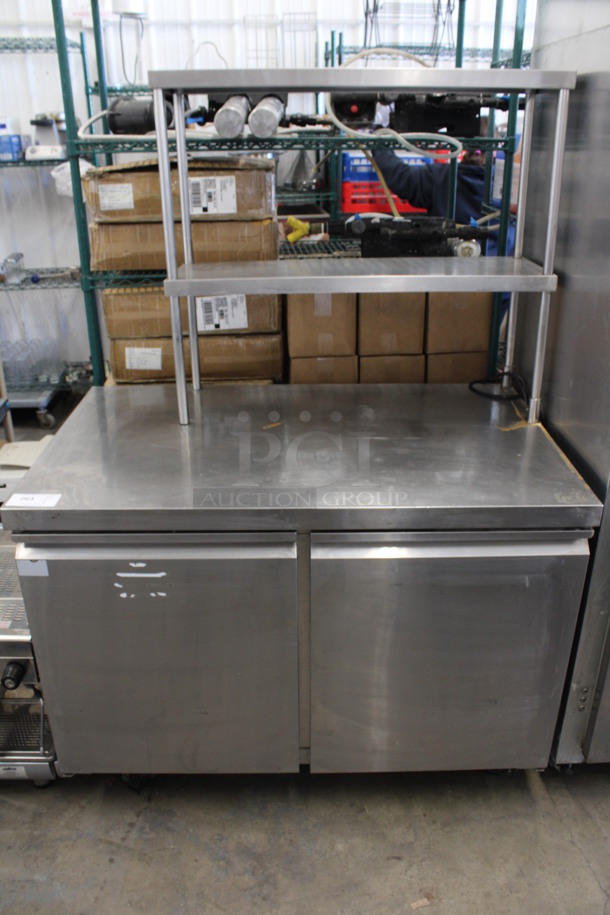 Avantco Model 178SSU48RHC Stainless Steel Commercial Work Top 2 Door Cooler w/ 2 Tier Over Shelf on Commercial Casters. 115 Volts, 1 Phase. 47.5x30x67.5. Tested and Powers On But Does Not Get Cold