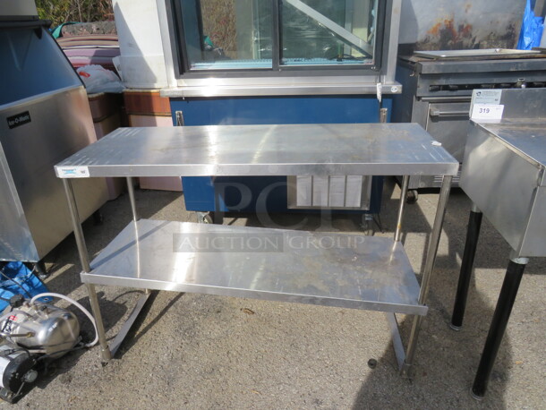 One Stainless Steel Table With Stainless Steel Under Shelf. 46.5X18X33.5