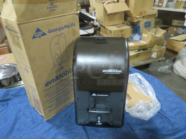 One NEW En Motion Automatic Hands Free Soap Dispenser.  - Image 1 of 1