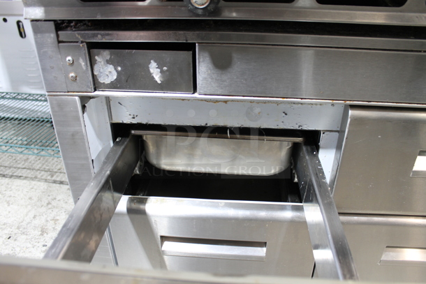 Stainless Steel Commercial Gas Powered Flat Top Griddle w/ Montague Stainless Steel 4 Drawer Chef Base on Commercial Casters. - Image 4 of 7